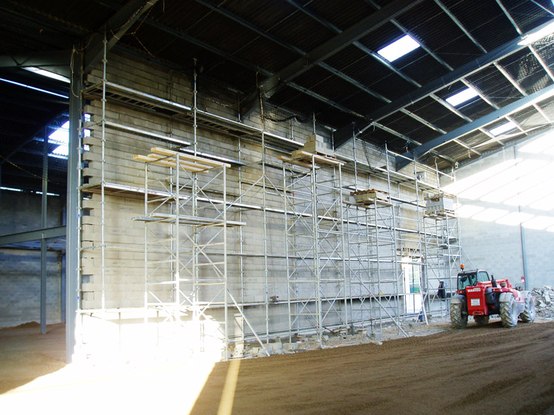 Mur en agglos d'hangar